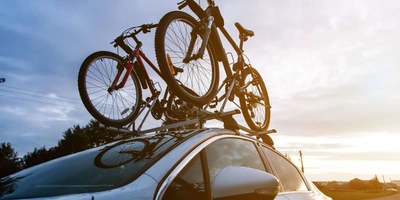 Fahrrad im Auto mitnehmen - auf dem Dach Fahrrad im Auto mitnehmen - auf dem Dach